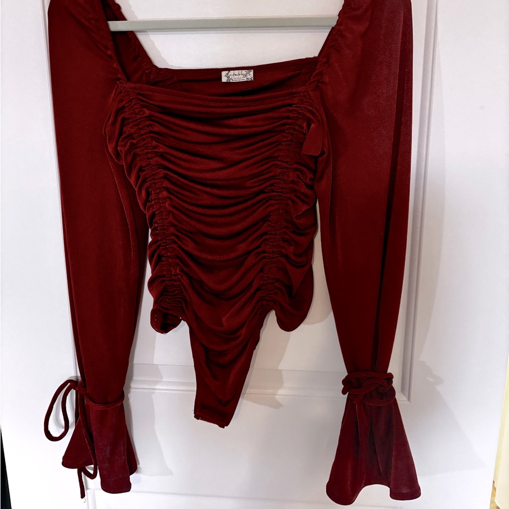 Like new free people body suit